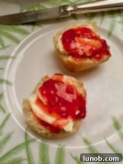 A plate of traditional round Scottish scones, ready to be served.