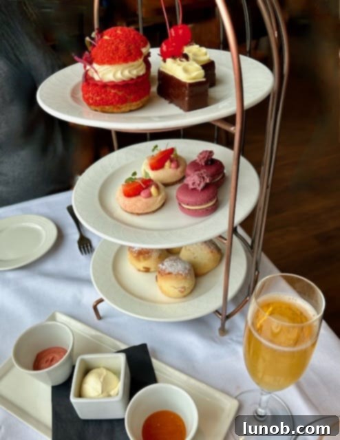 A display of various baked goods, including scones, at a cafe.