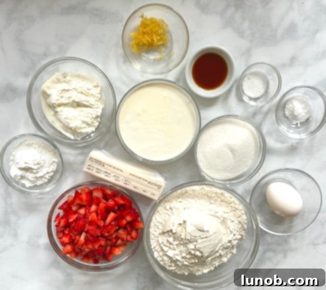 Various measured ingredients in bowls on a kitchen counter.