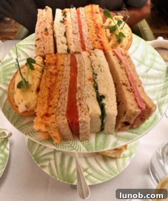 Balmoral Palm Court's Exquisite Afternoon Tea 19 Close-up of tea sandwiches on the tiered server