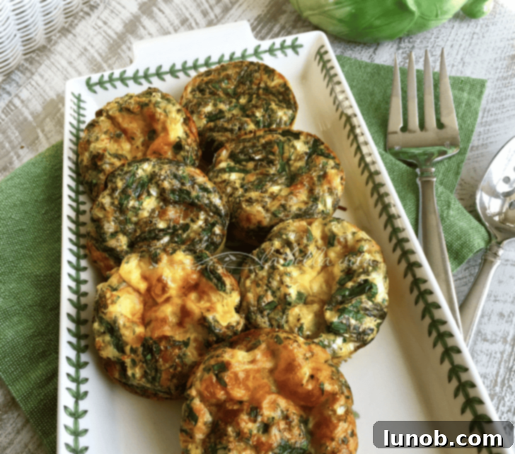 Mini Frittatas with Asparagus and Six Italian Cheeses, served on a platter.