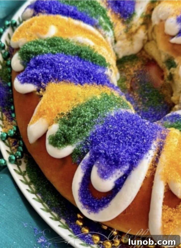 Festive King Cake with Apple, Cinnamon, and Cream Cheese Filling