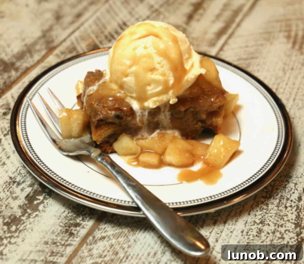 Warm Bread Pudding topped with Caramel Apple Sauce