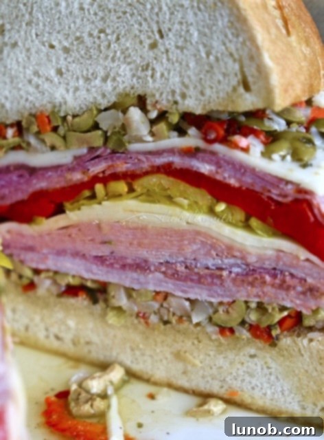 Classic New Orleans Muffuletta sandwich with olive salad
