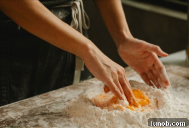 Mixing potato flour mixture with egg.