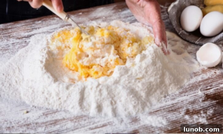 Mixing gnocchi dough with a fork.