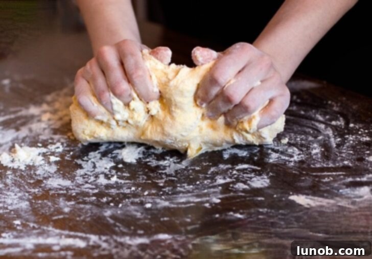 Dough being gently pressed.