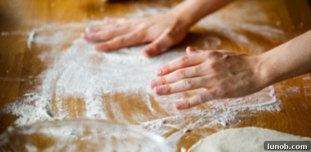 Floured wooden board for gnocchi preparation.
