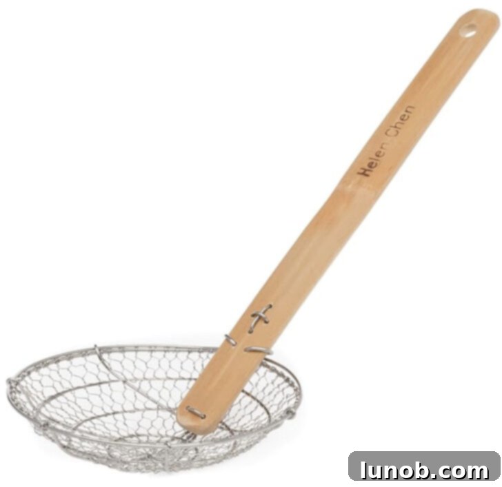 Spider strainer for delicate food retrieval.