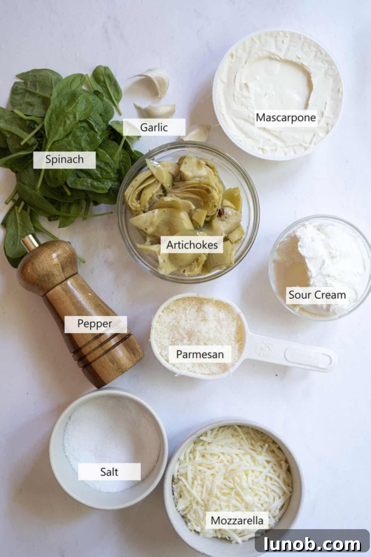Creamy No-Mayo Spinach Artichoke Dip 3 Ingredients for the recipe.