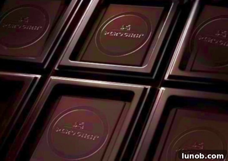 Close-up of high-quality Italian dark chocolate, specifically Perugina, ready to be used for Cioccolata Calda.