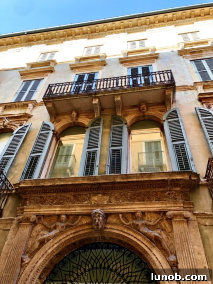 Historic building on Via Mazzini, Verona, now home to a luxury brand