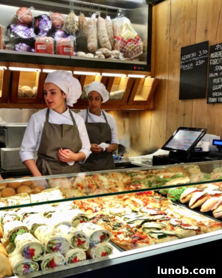 Charming window display of a sweet French boutique in Verona