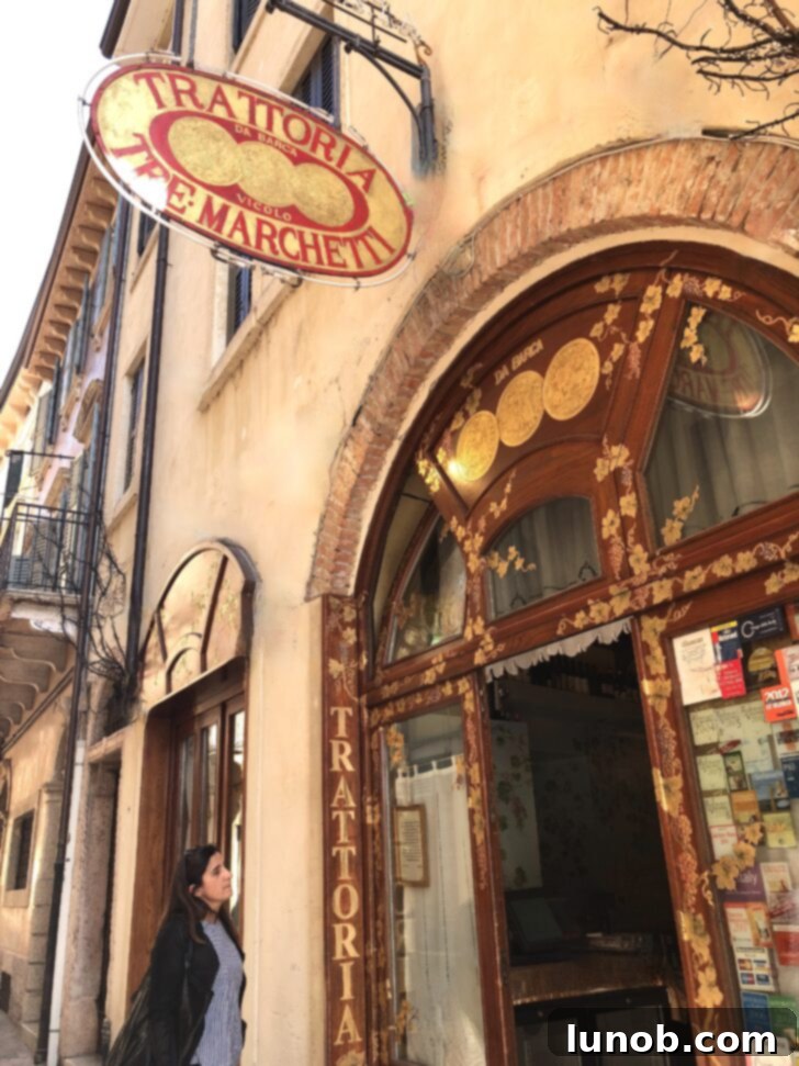 Cozy and romantic interior of Tre Marchetti trattoria in Verona