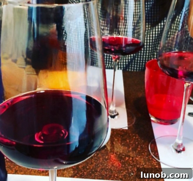 Delicious bowl of gnocchi in fresh tomato sauce with pistachios and basil