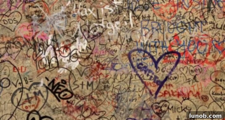 Close-up of love notes and graffiti on the walls near Juliet's House in Verona