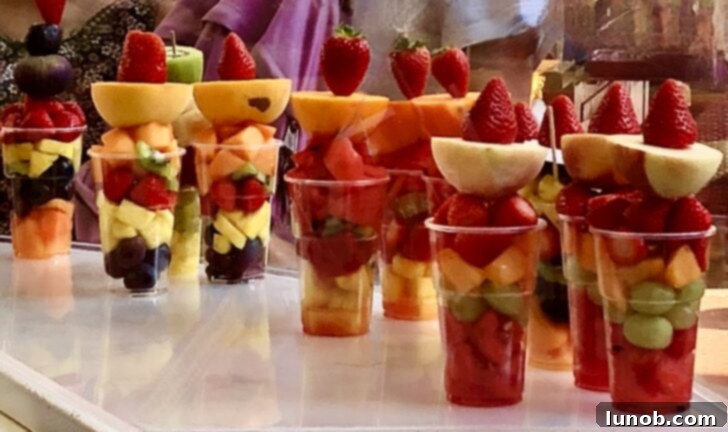 Overview of Piazza delle Erbe with market stalls and historic buildings