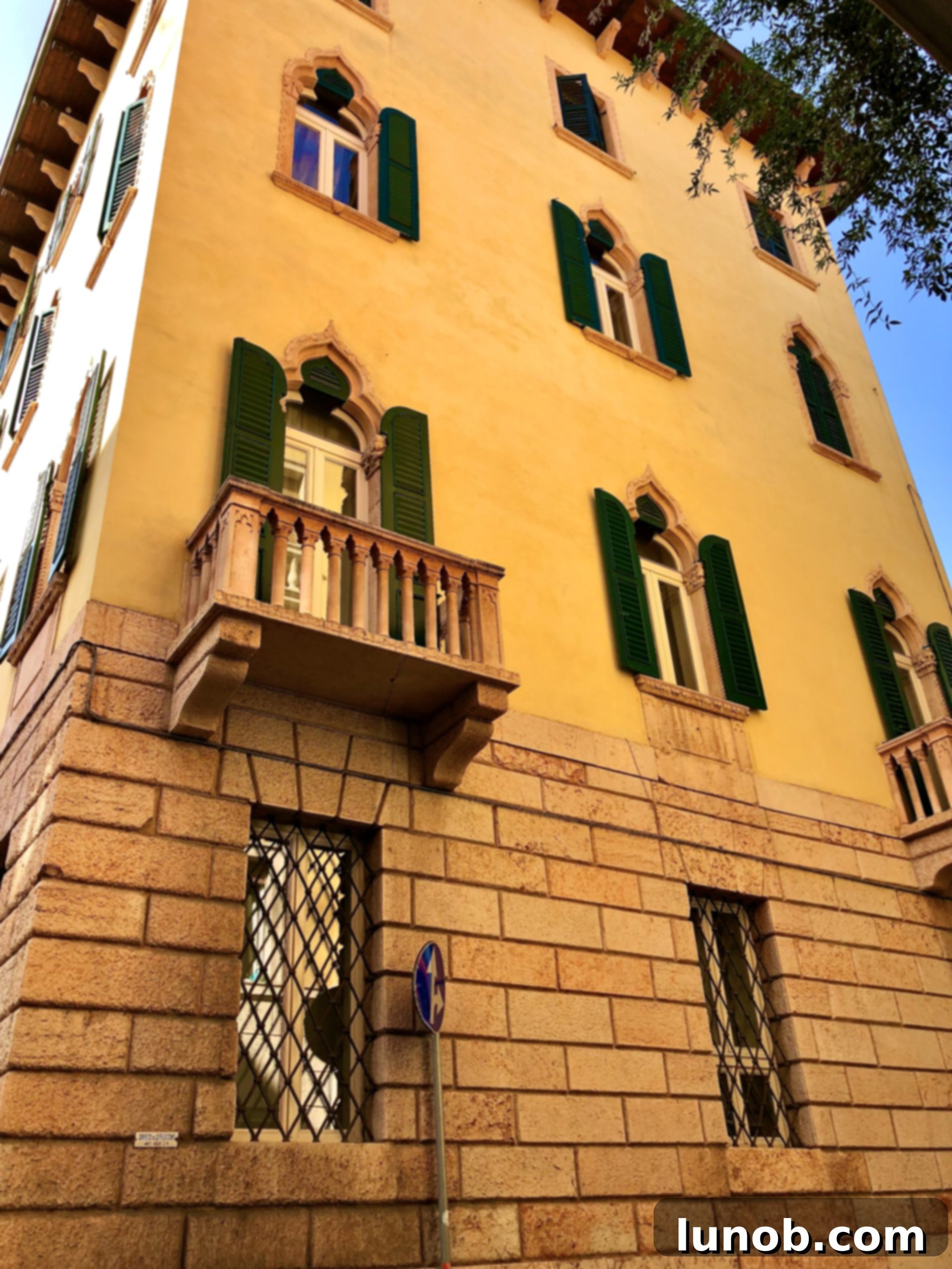Window boxes overflowing with fresh flowers in Verona, Italy