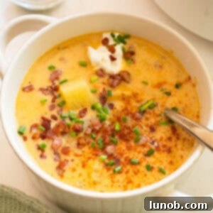 Velvety Potato and Onion Soup 14 Creamy potato and onion soup topped with pancetta, chives, and sour cream.