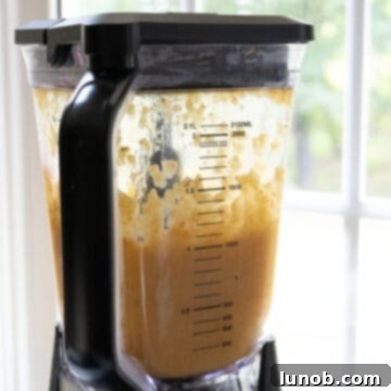 Velvety Potato and Onion Soup 9 Half of the soup blended in the blender.