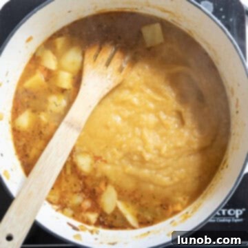 Velvety Potato and Onion Soup 10 The blended half of the soup transferred back to the pot.