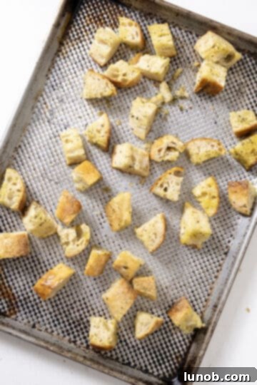 Crispy Homemade Parmesan Croutons 6 Pieces of bread chopped up and seasoned with olive oil and, garlic and seasonings.