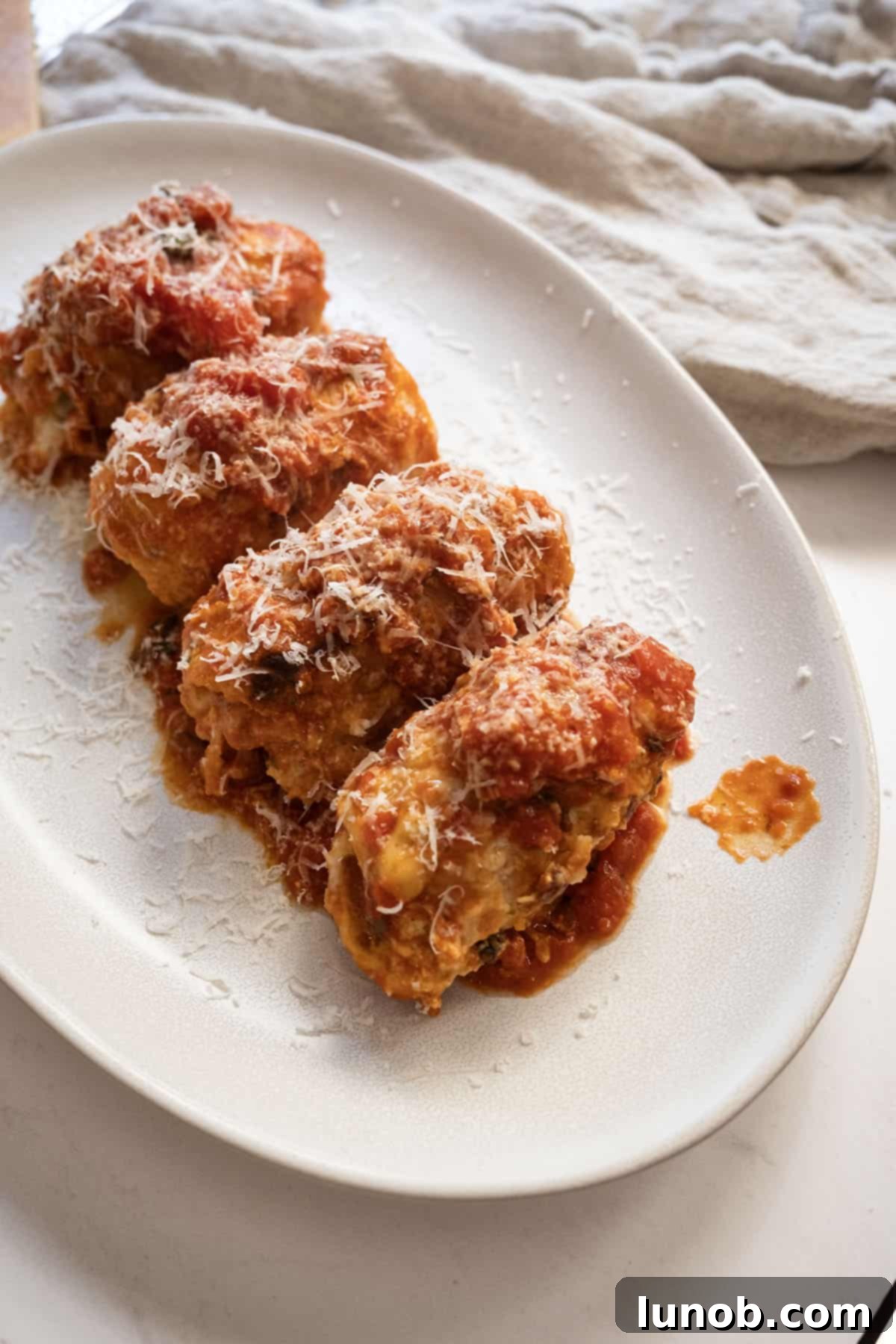Beautifully arranged Chicken Rollatini on a serving tray, ready to be enjoyed.