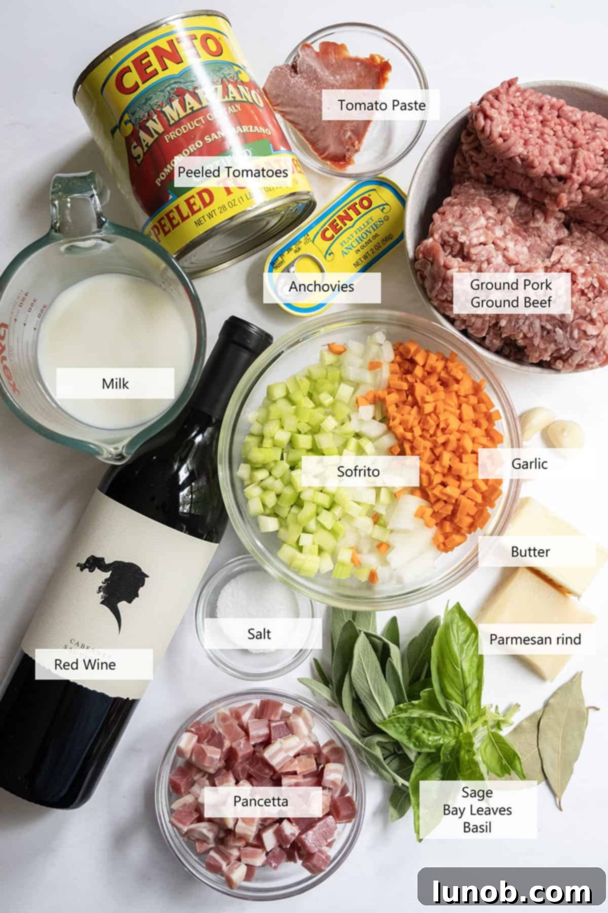 Classic Ragu Bolognese 3 Ingredients for authentic bolognese including various vegetables, meats, and spices.