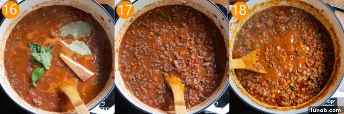 Classic Ragu Bolognese 9 Simmering bolognese in a pot.