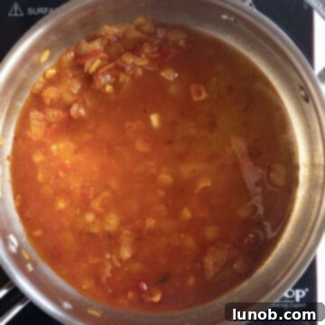 Simmering wine in the pan.