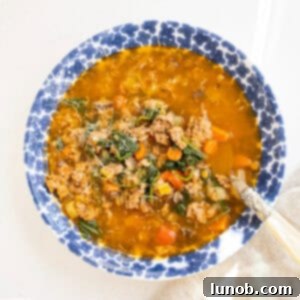 Soul-Warming Sausage and Lentil Soup 11 Bowl of sausage and lentil soup.