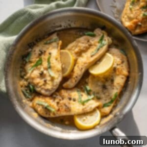 Chicken piccata in a saucepan.