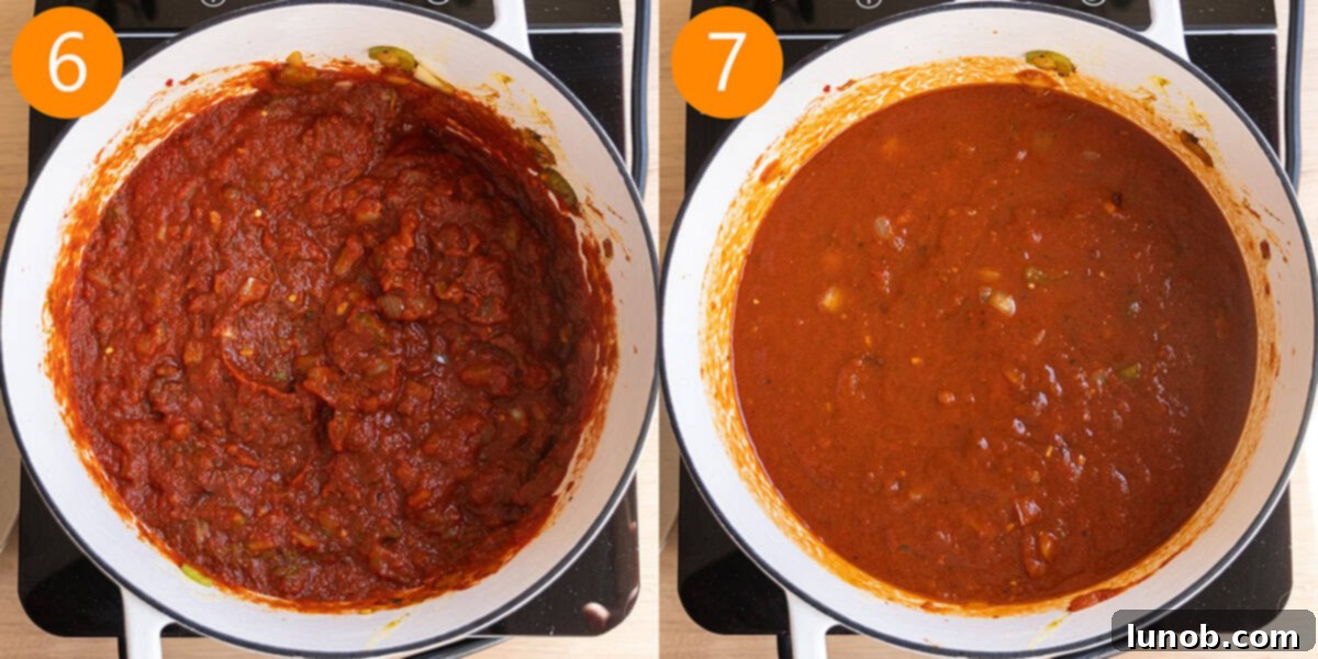 Velvet Butter Chicken Soup 8 Crushed tomatoes and chicken broth being added to the sautéed vegetables and tomato paste in a large pot.
