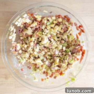 The chopped Italian salad mixed in a bowl.