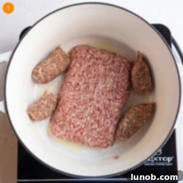 Browning sausage in a dutch oven.