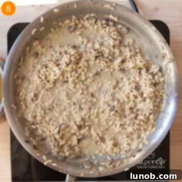 Finishing risotto in a pan combined with gorgonzola and butter.