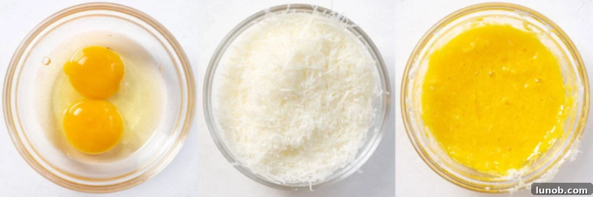 The Art of Perfect Carbonara 6 Combining finely grated pecorino romano and room temperature eggs in a bowl for carbonara sauce, ensuring a smooth mixture.