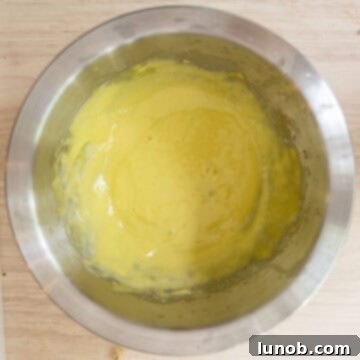 Gourmet Gorgonzola Grilled Chicken Burger 8 Pale yellow garlic aioli whisked together in a bowl.