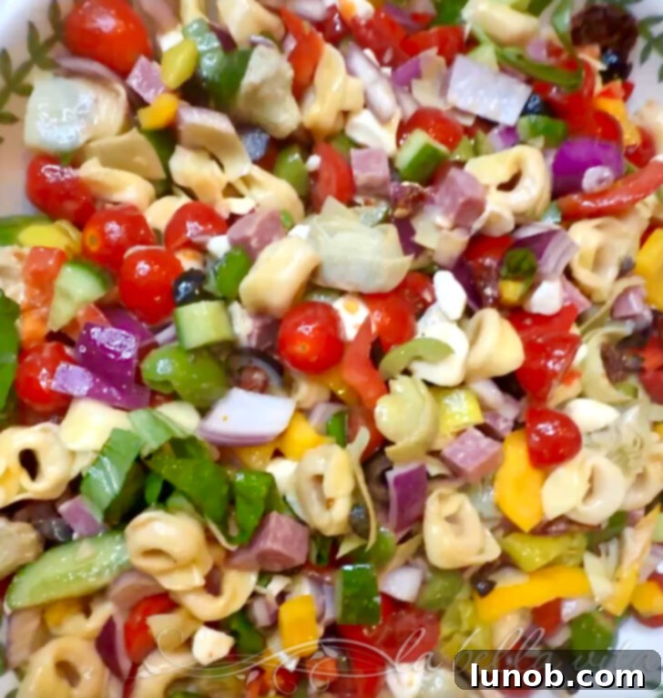 Italian Pasta Salad, a colorful mix of tortellini and fresh vegetables