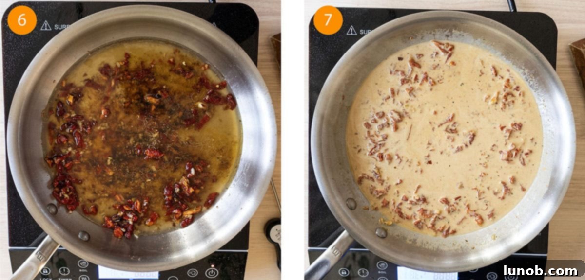 Simmering chicken broth and heavy cream in a saucepan, creating a rich base for the pasta sauce.