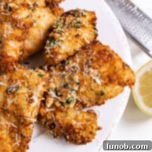 Air fried chicken in a garlic sauce, ready to be served and enjoyed.