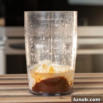 Dynamite Chicken Skewers 4 Chipotle mayo ingredients combined in a mixing cup, ready for blending.