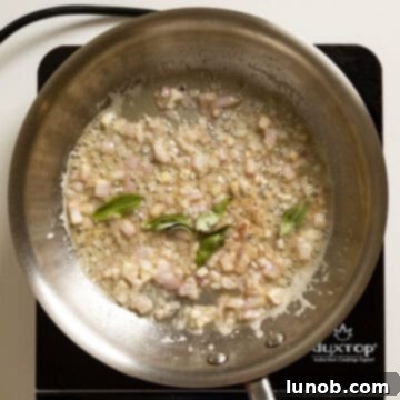 Velvety Pumpkin Pasta 7 Chopped shallots and fresh sage leaves being sautéed gently in the brown butter until softened and fragrant.