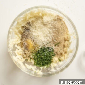 Crispy Cauliflower Fritters 6 Egg, breadcrumbs, parmesan, parsley, salt, and pepper combined with mashed cauliflower.