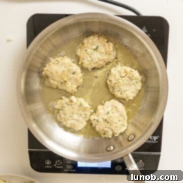 Crispy Cauliflower Fritters 8 Frying cauliflower cakes in olive oil.