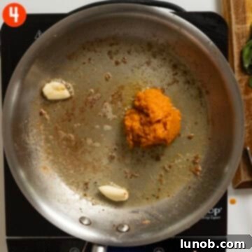 Pumpkin Gnocchi Perfection 7 Pumpkin puree added to the butter sauce, stirring to caramelize.