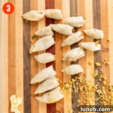 Savory Stuffed Squid 6 Stuffing the calamari on cutting board.