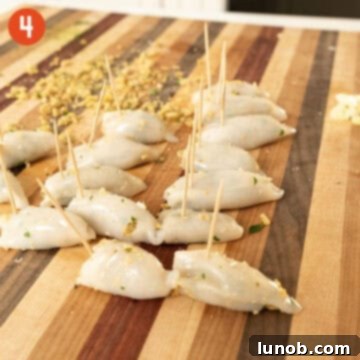 Savory Stuffed Squid 7 Closing the calamari with tooth picks.