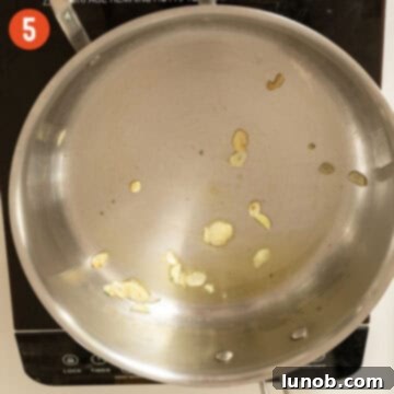 Savory Stuffed Squid 8 Sauteing garlic in olive oil.