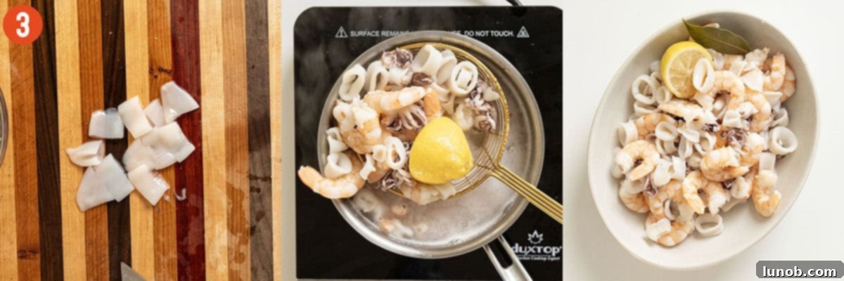 Shrimp and sliced calamari being gently poached in a pot of simmering liquid, ensuring delicate cooking.